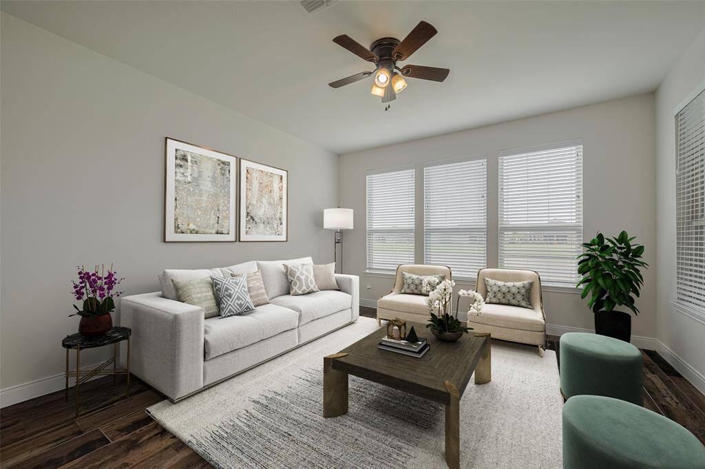 You will love spending time in the sunroom. Virtually staged.