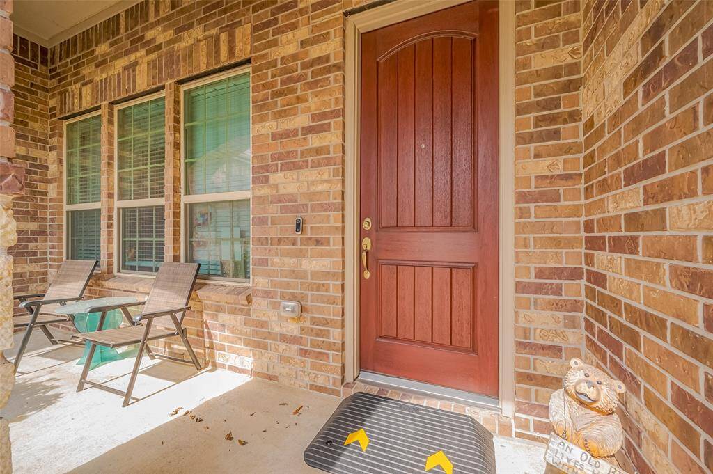 The entrance has a covered front porch - perfect place to while away the afternoon.