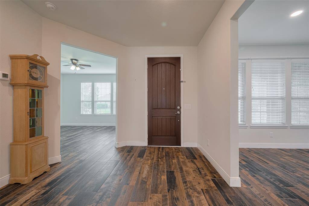 Spacious entry with the study on the right and breakfast/kitchen on the left.