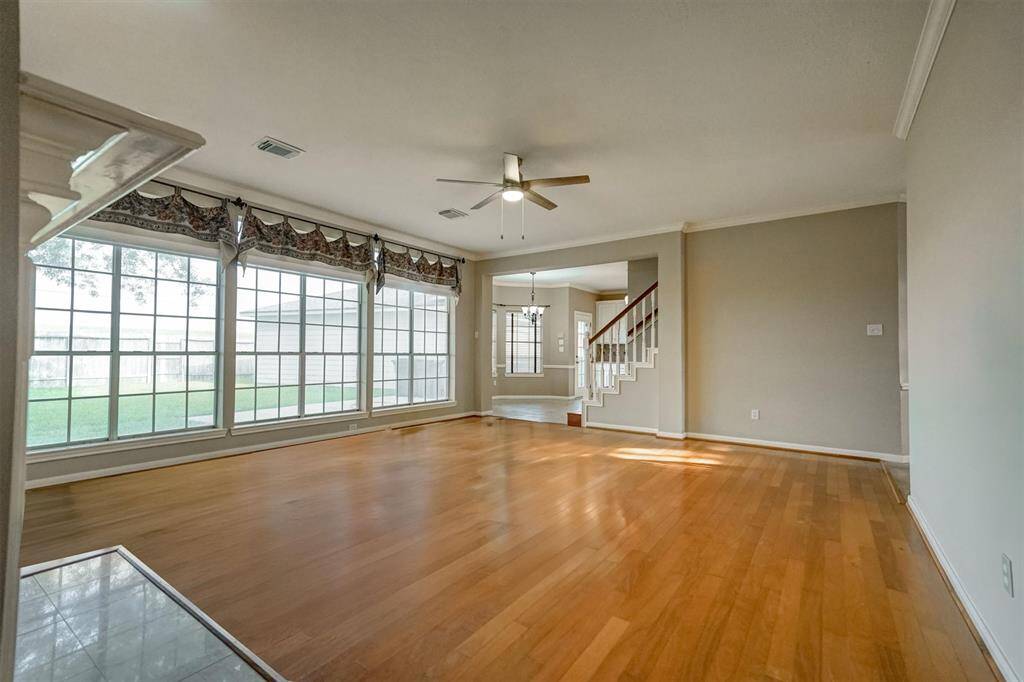 Large windows offer beautiful views of the backyard while filling the room with natural light.