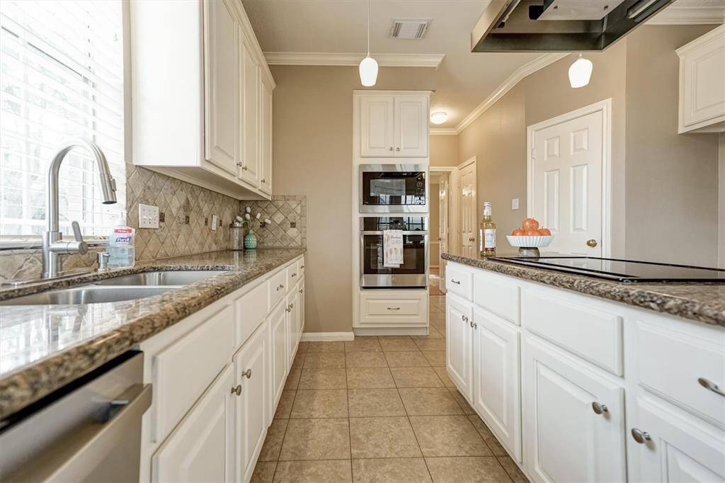 Outfitted with brand new GE appliances—including a built-in oven, microwave, and dishwasher