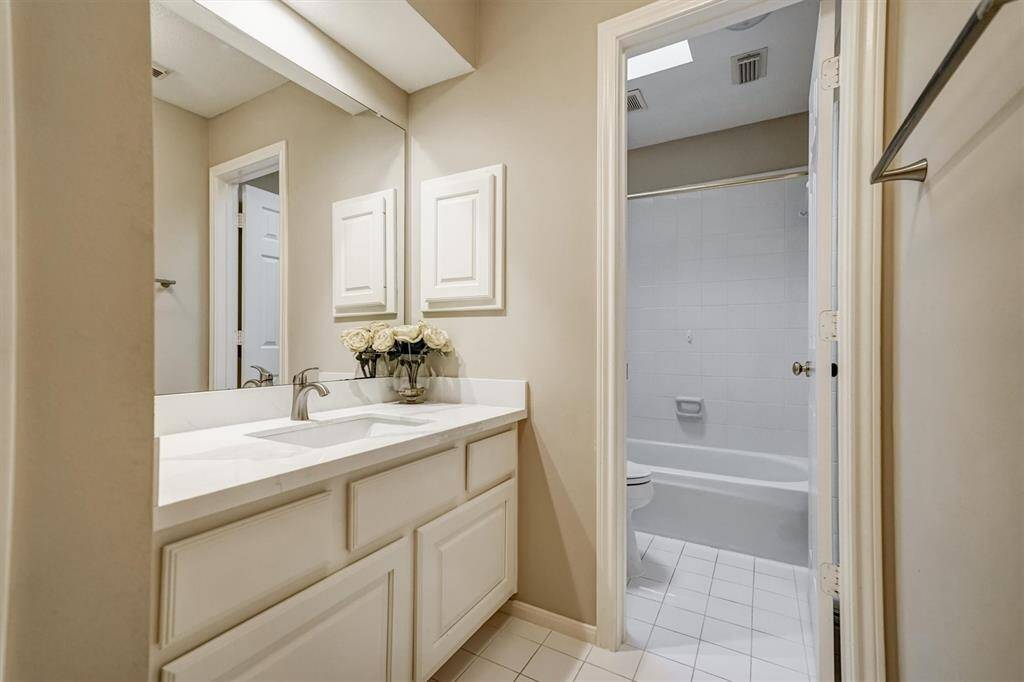2nd full bathroom with separate sink and countertop