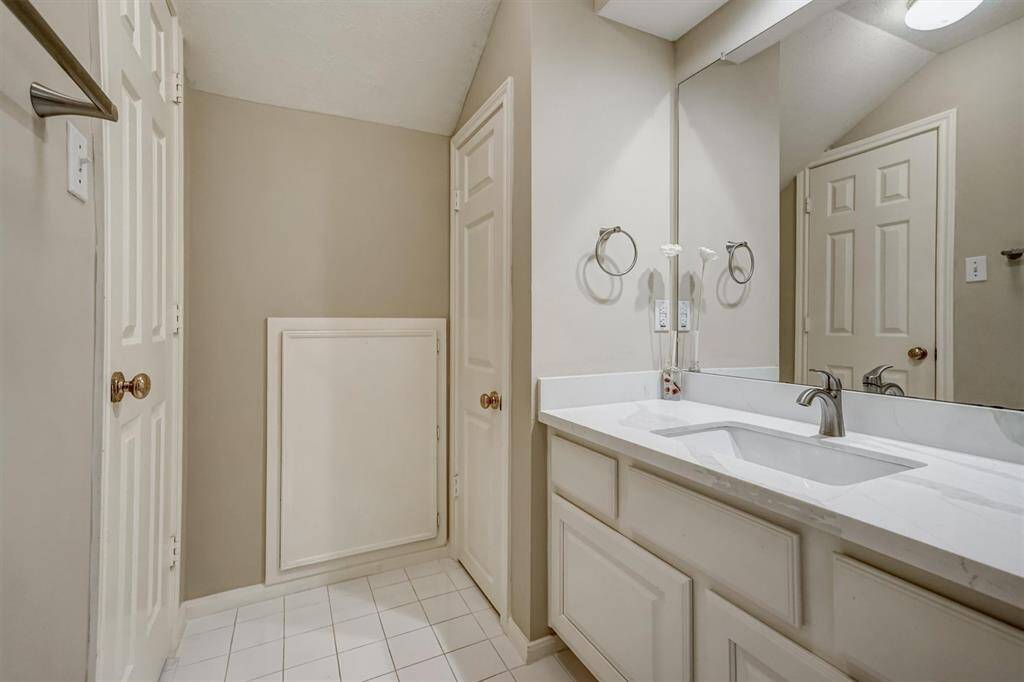 2nd full bathroom with separate sink and countertop