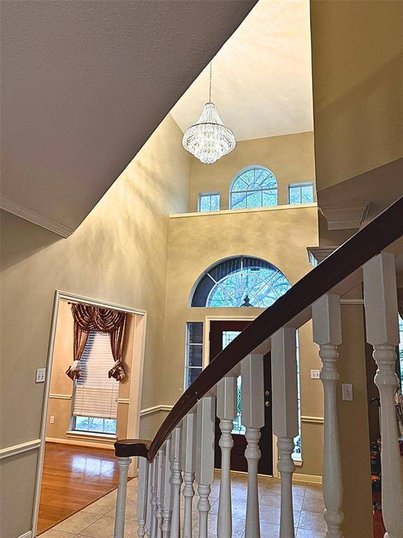 A striking, elegant ceiling light that sets the tone for the entire home