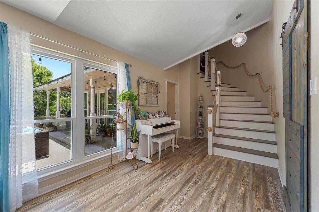 Stairs lead up to a loft area
