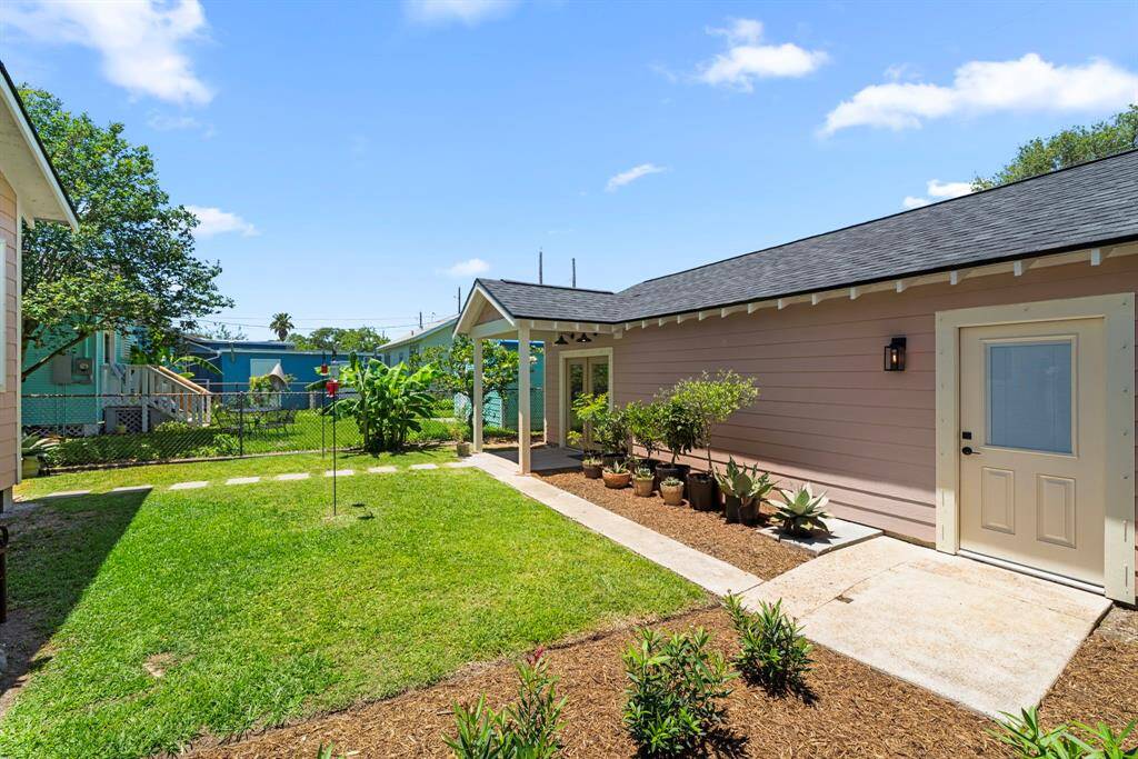 View of guest suite and 2-car garage access.