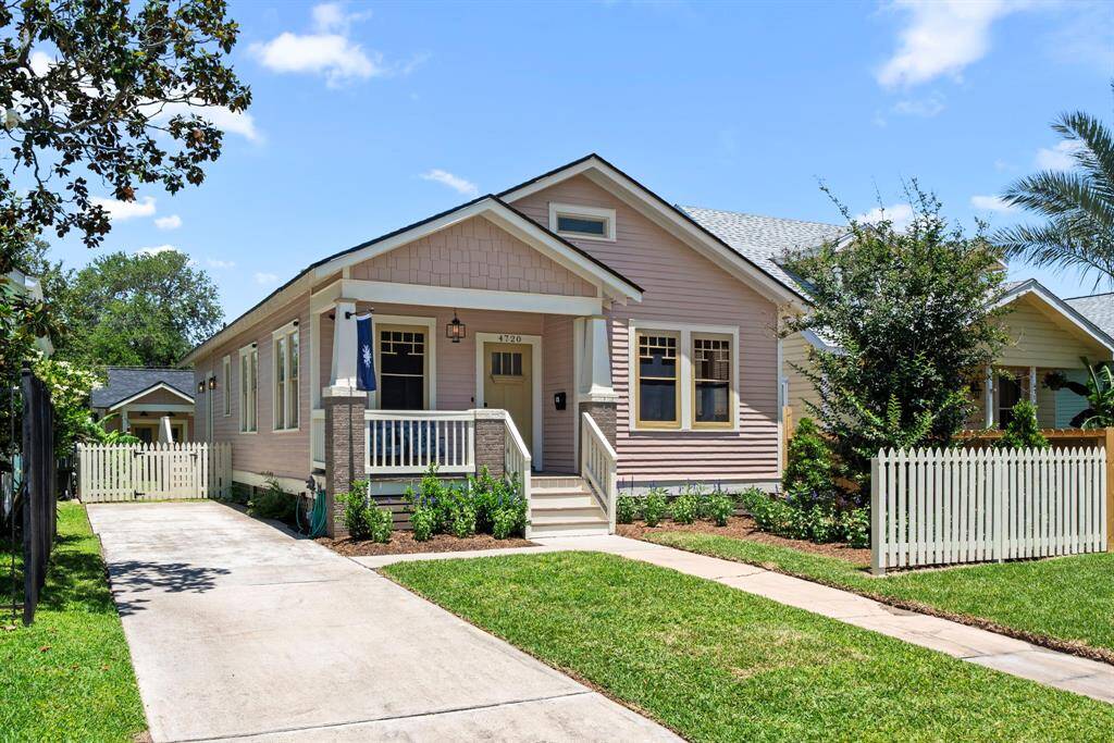 Ample off-street parking and 2-car garage access behind the property.