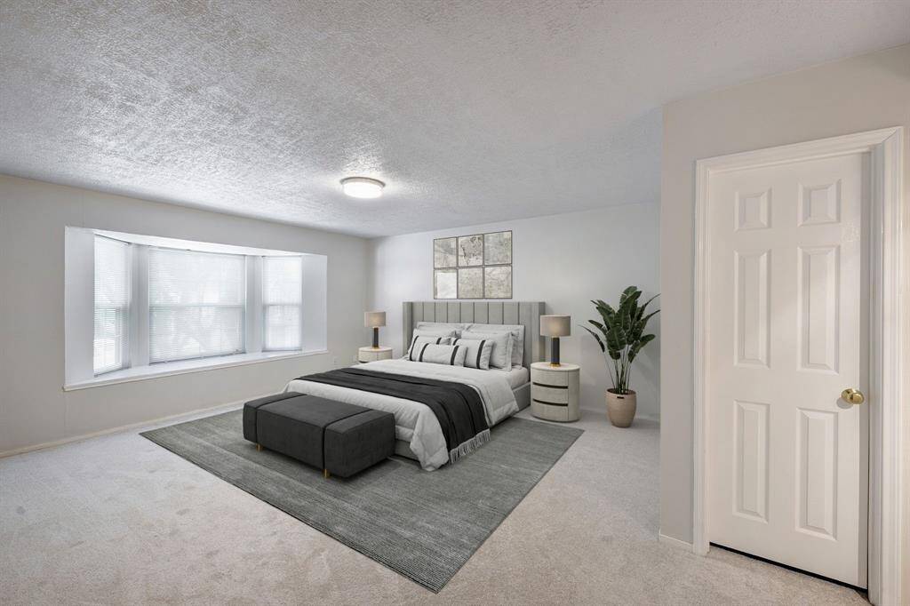 Virtually staged. Primary room large enough for a sitting area.