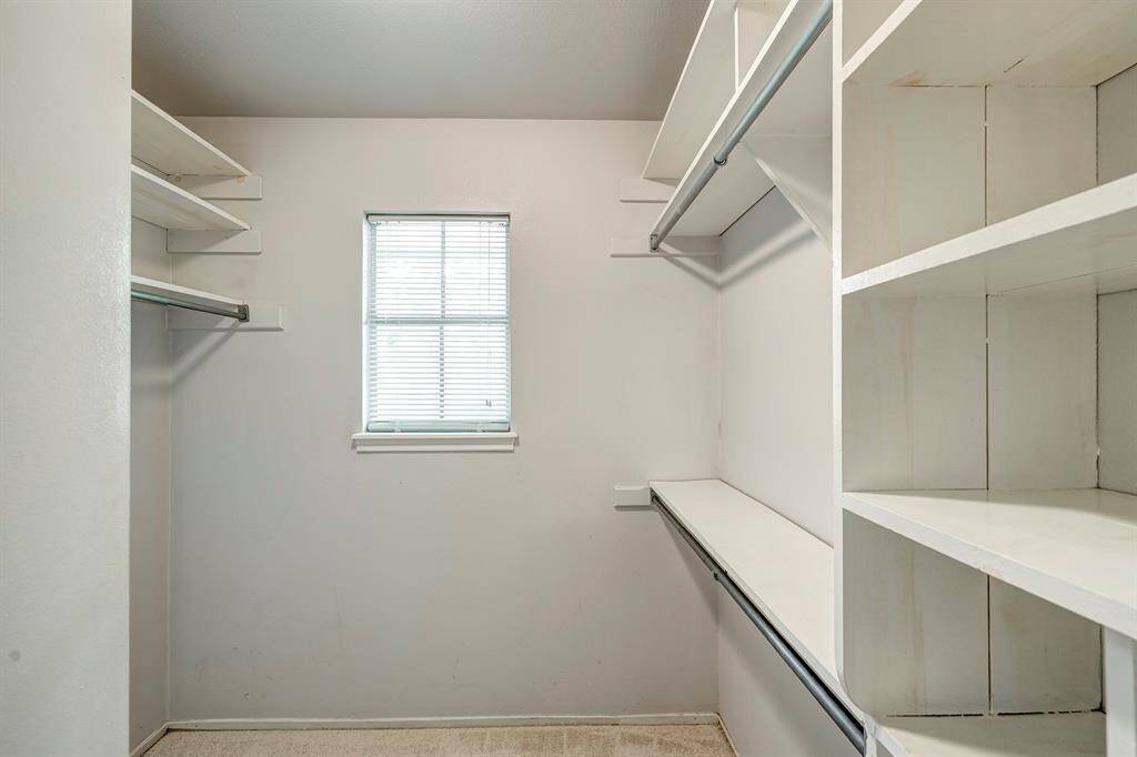 Primary closet has a window to help you see colors better1