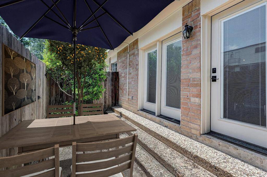 Virtually staged. Patio has room for soda table and chairs. Gate to parking & Storage