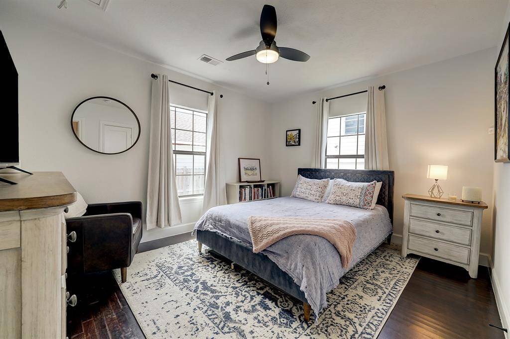 This is one of the spacious secondary bedrooms bathed in natural light.