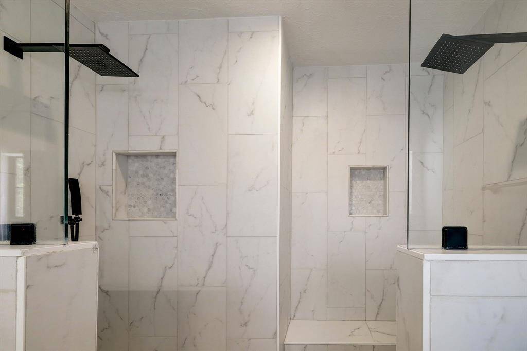 Double shower offers luxury and convenience.