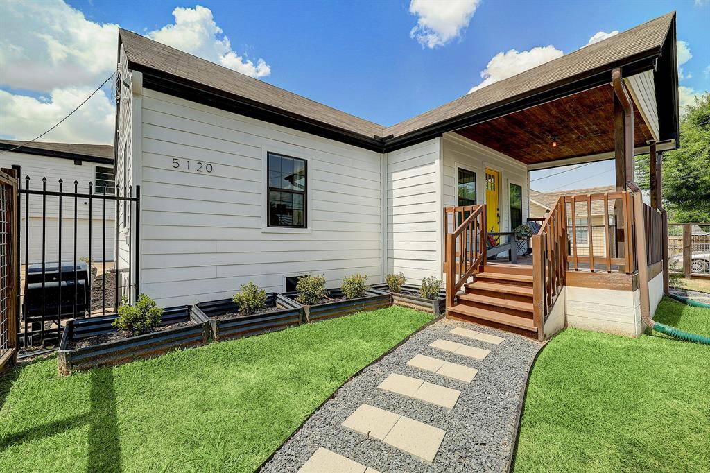 Multiple walking paths, fresh grass and landscaping were added by the current owner.