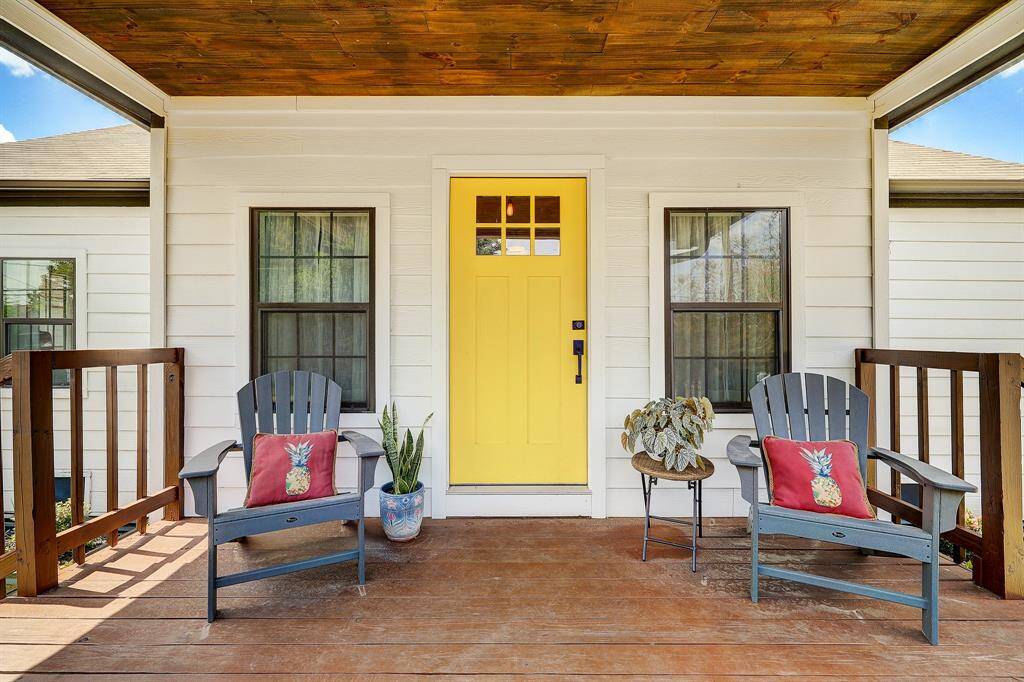 The covered front porch is so inviting and a great place to greet your guests.
