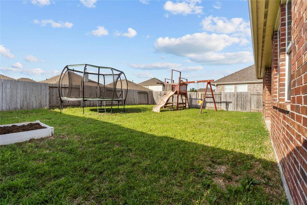 Large outdoor space with endless possibilities: play area, garden, or your dream backyard setup.