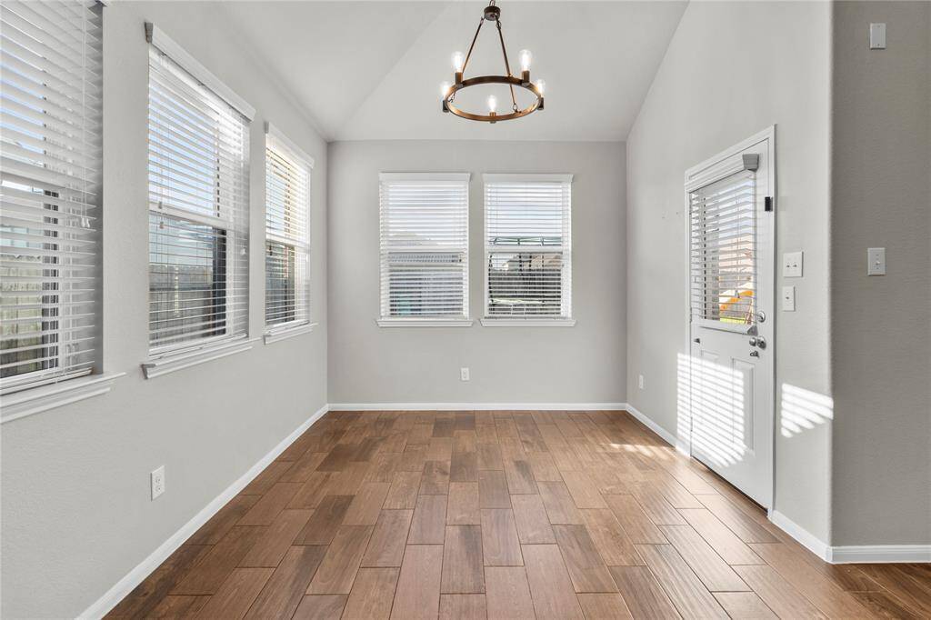 Light, bright, and sunlit dining area—perfect for everyday meals or entertaining guests.