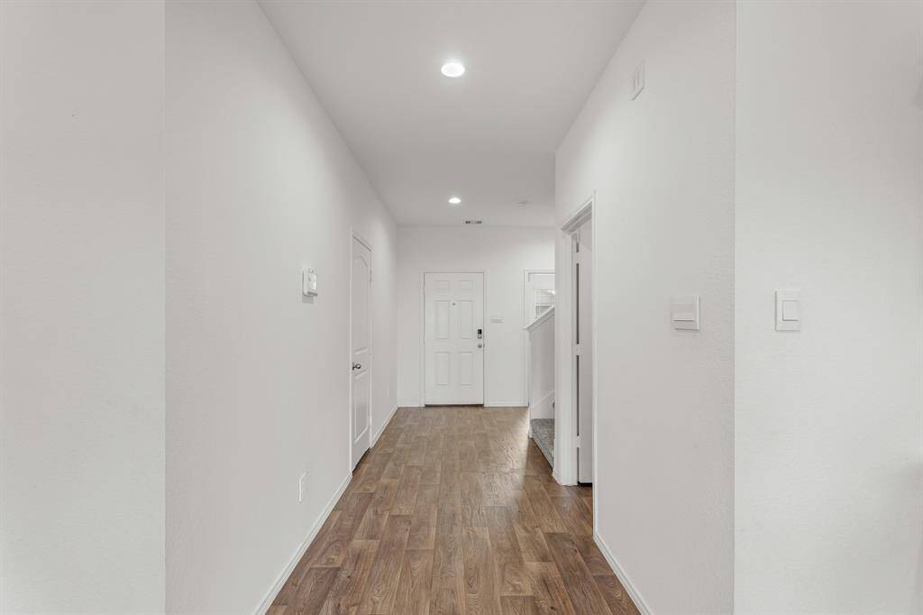 Let's head to back to the front of the home to see the unique laundry room and downstairs bedroom! Upstairs, you will find 2 additional bedrooms and a game room!