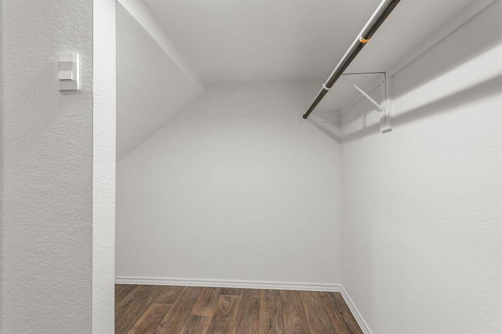Huge closet underneath the stairs, giving plenty of room for storage! It connects to the laundry room making it easy to access and use