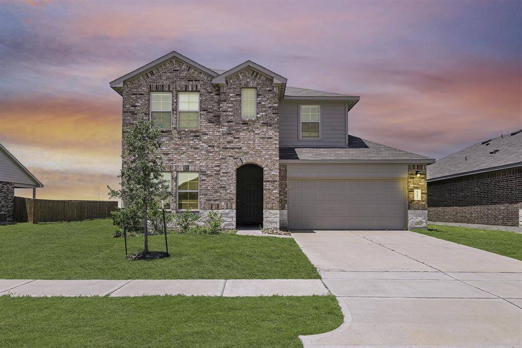 Welcome home to 5323 Cherry Tallow Trail! This spacious 2 stoy home sits on a spacious lot with NO back neighbors and welcomes you with a warm brick and stone exterior.