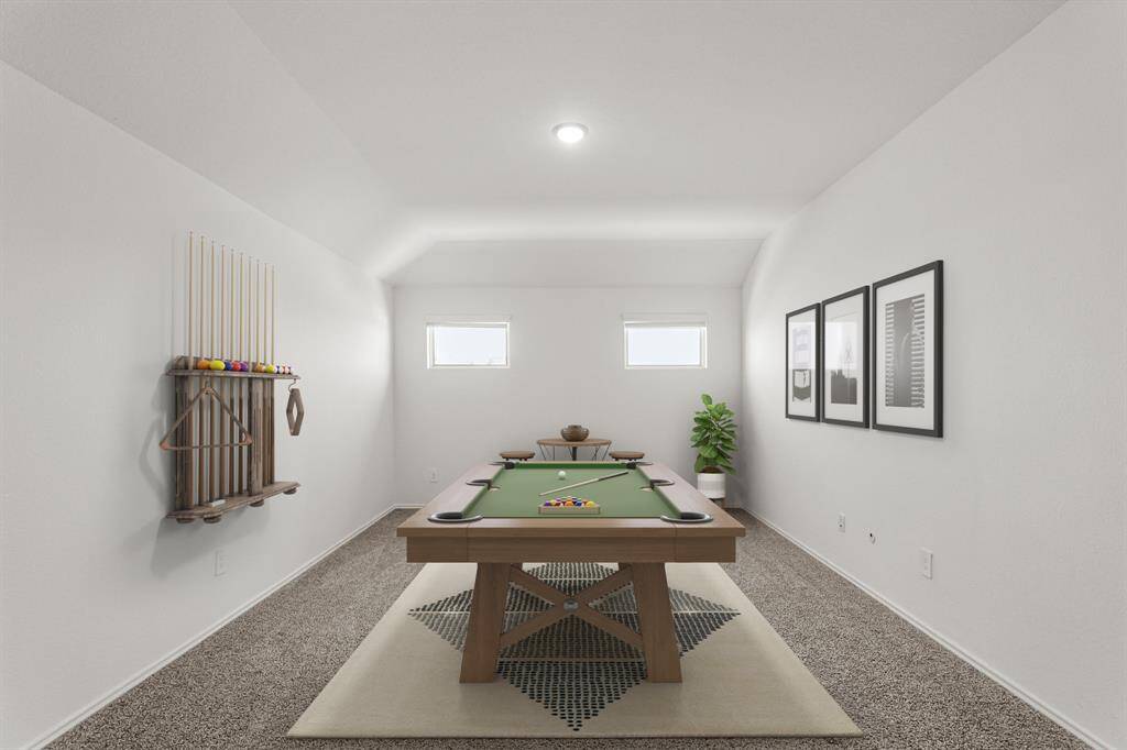This primary bedroom greets you with plush carpet, high ceilings, and large windows with blinds allowing in natural light to brighten up this spacious primary bedroom. *This photo has been virtually staged