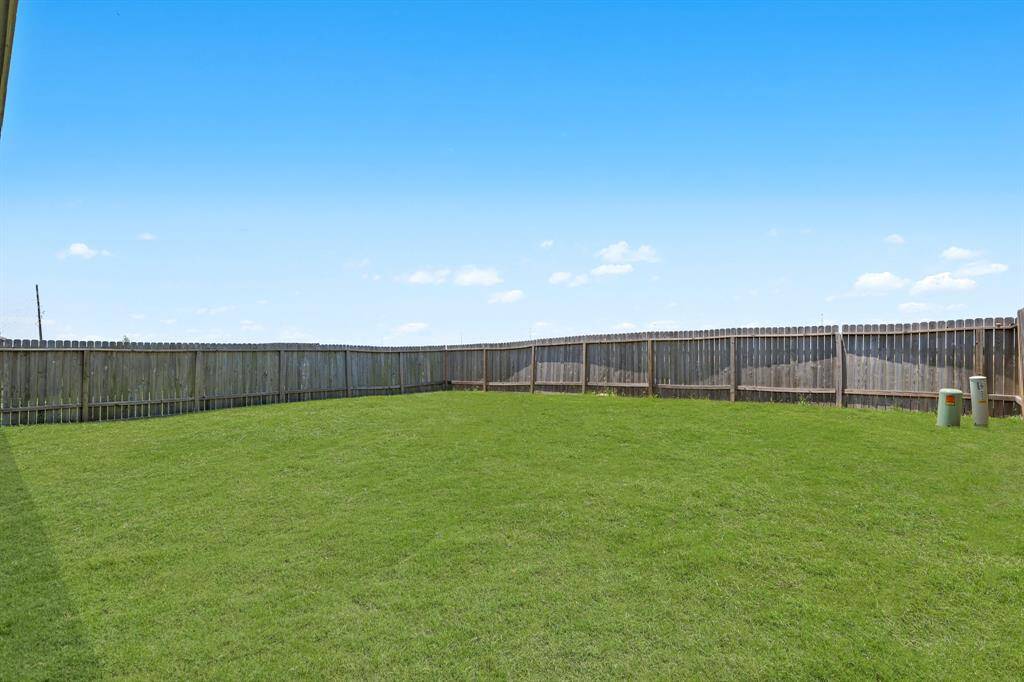 Step outside to enjoy the expansive backyard! It offers plenty of privacy with No back neighbors! There's plenty of greenspace to enjoy!