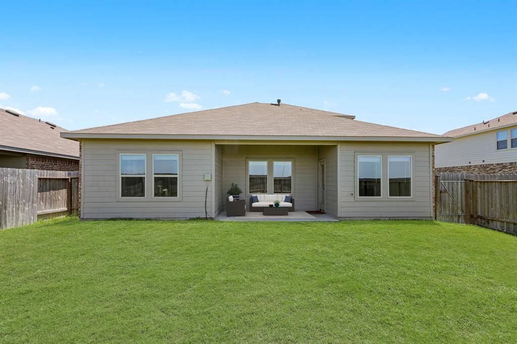 Outdoor living at its finest! This covered patio is perfect for relaxing or entertaining year-round. Just add good company and enjoy! *This photo has been virtually staged