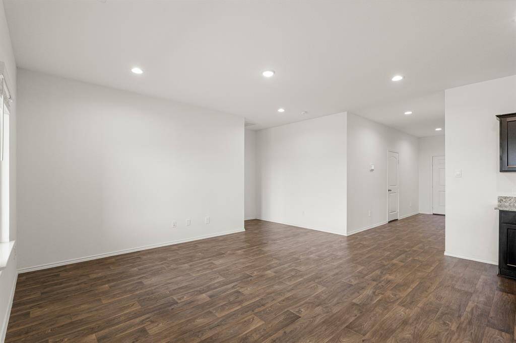 This light and bright spacious living room is the perfect layout for entertaining or just relaxing!