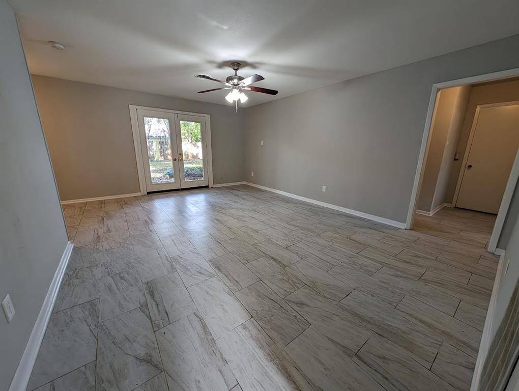 Living Room with access to back yard