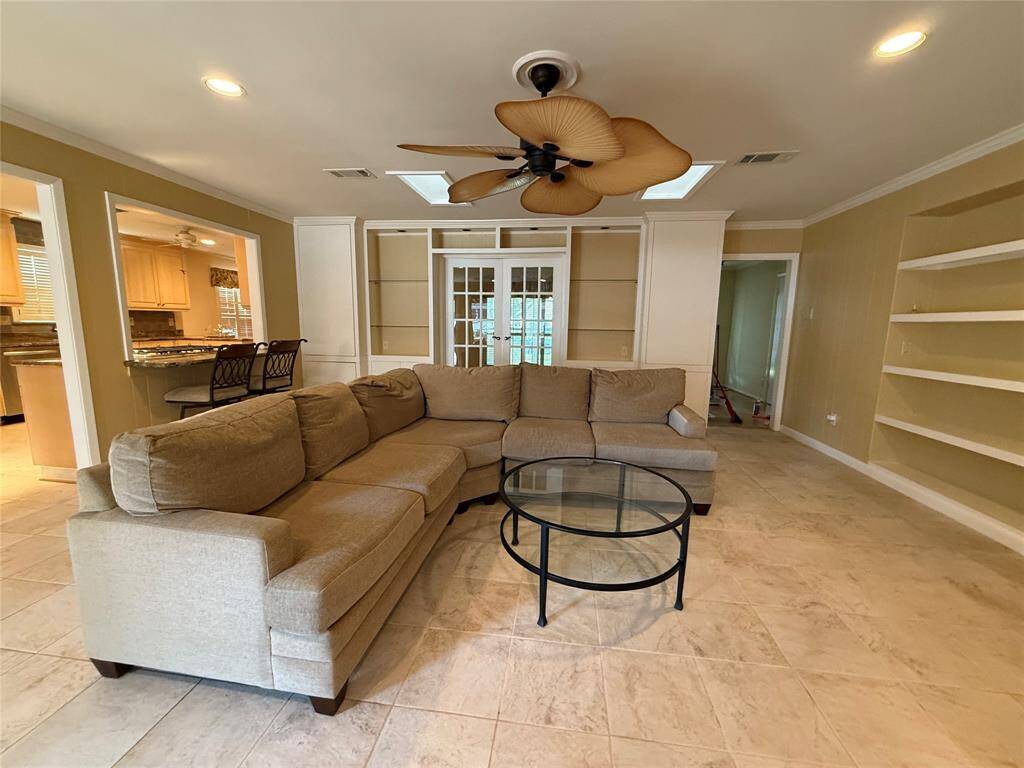 Updated family room with custom built-ins.