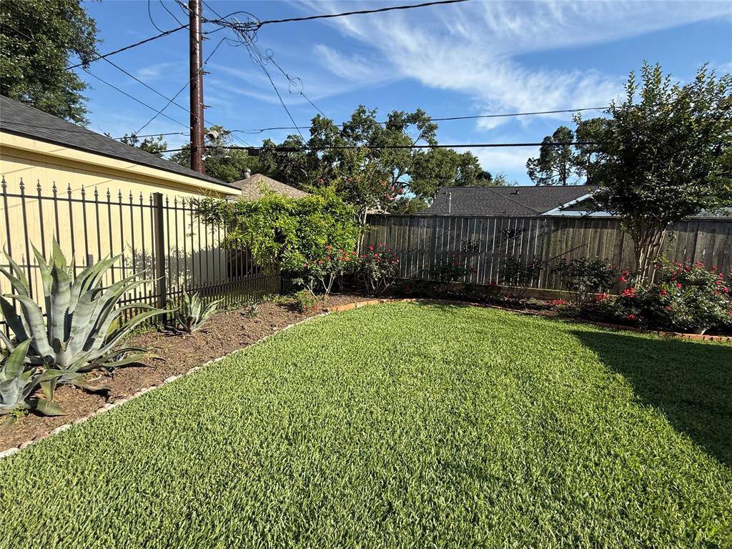 Manicured and landscaped back yard.