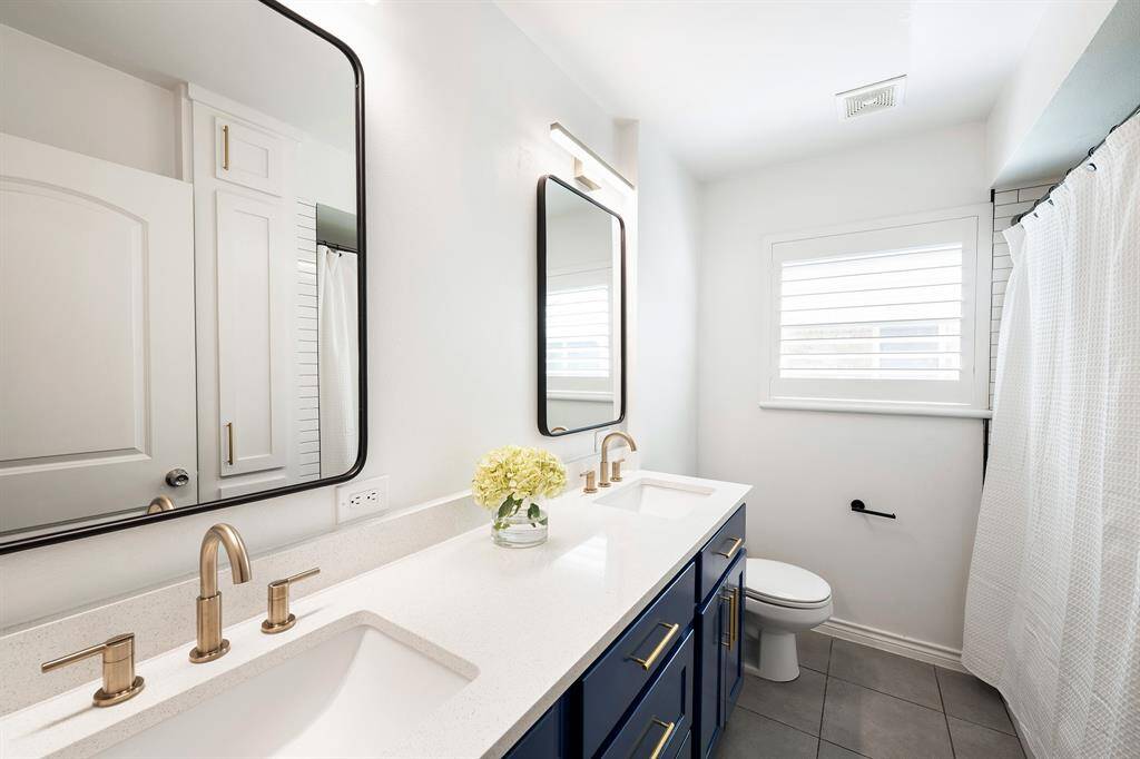 Hall bath with double vanity and great updates