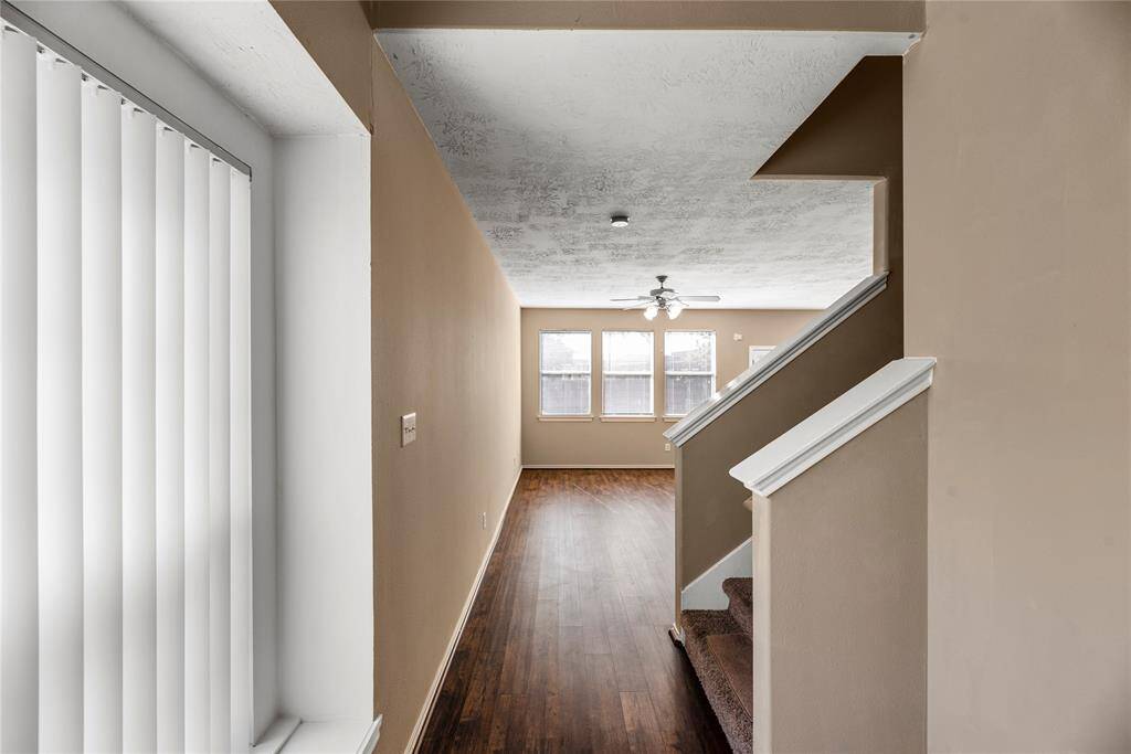 As you step into the home, you're welcomed by low-maintenance vinyl wood plank flooring that effortlessly combines style with durability.