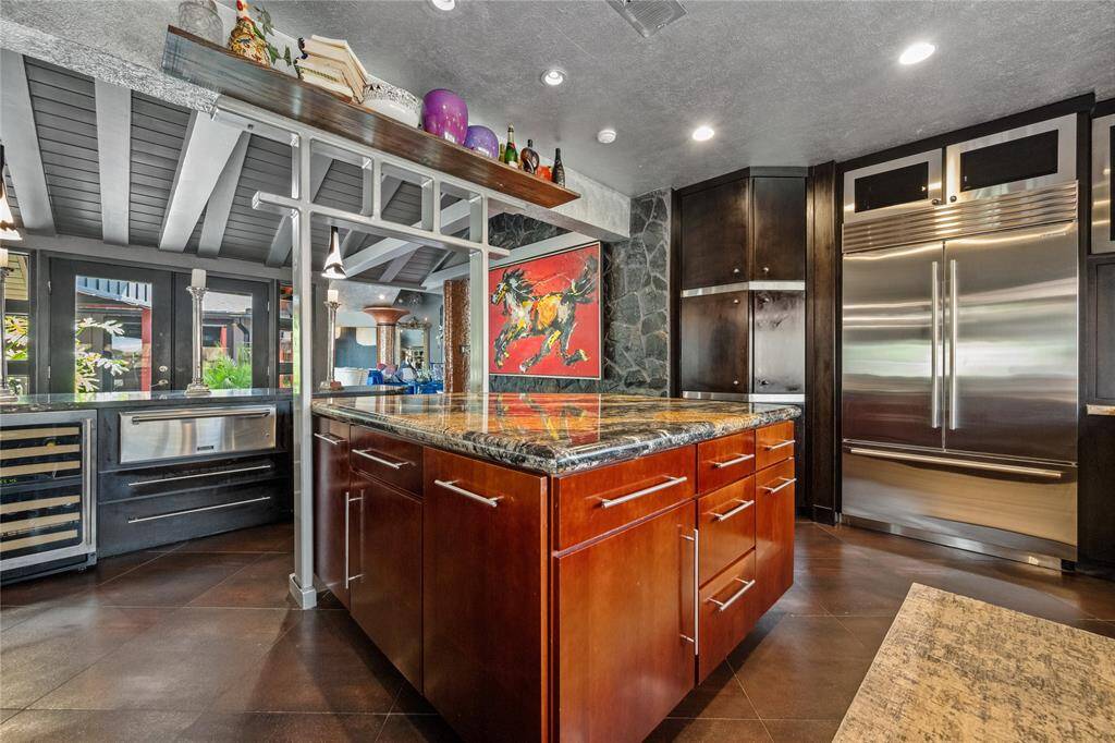 A chef’s kitchen featuring premium stainless steel Thermador appliances.