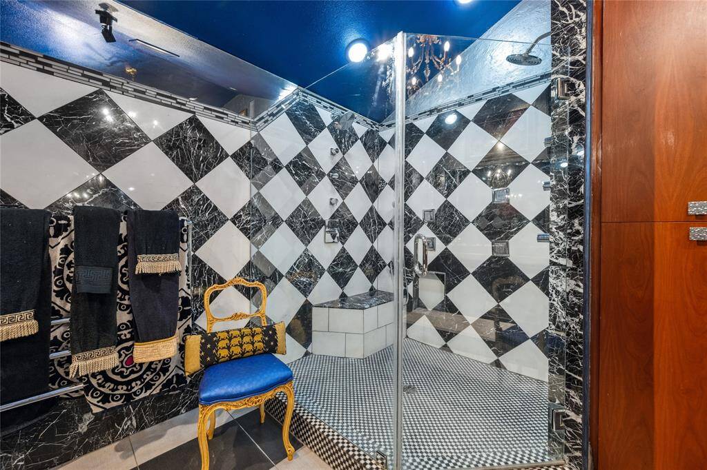 Primary suite separate glass shower,