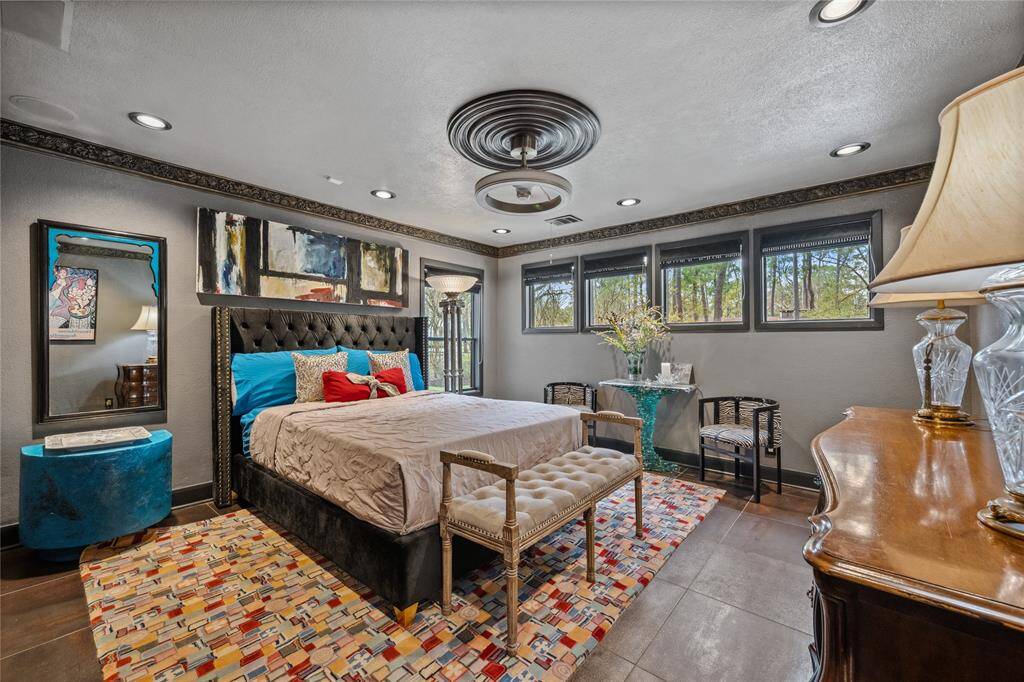 Secondary bedroom at the front of the home features an ensuite bath.