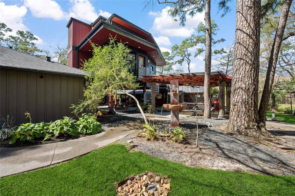 View of the back of the home and the tree house apartment.
