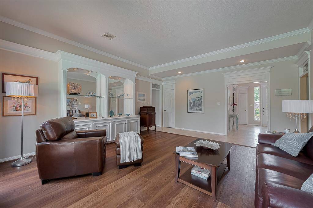 As you tour this home, notice the extensive crown moldings, custom built-ins and extras you will not find with new construction homes.