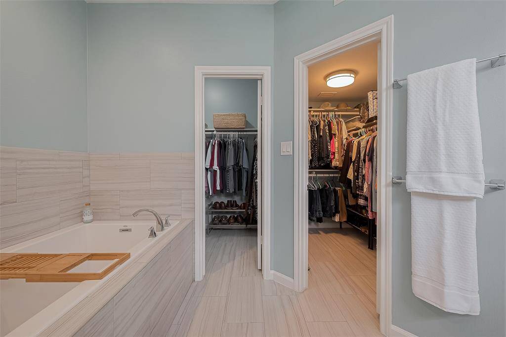 This oversized soaking tub is spacious and perfect for relaxing.  Double walk-in closets, good size for your storage needs.