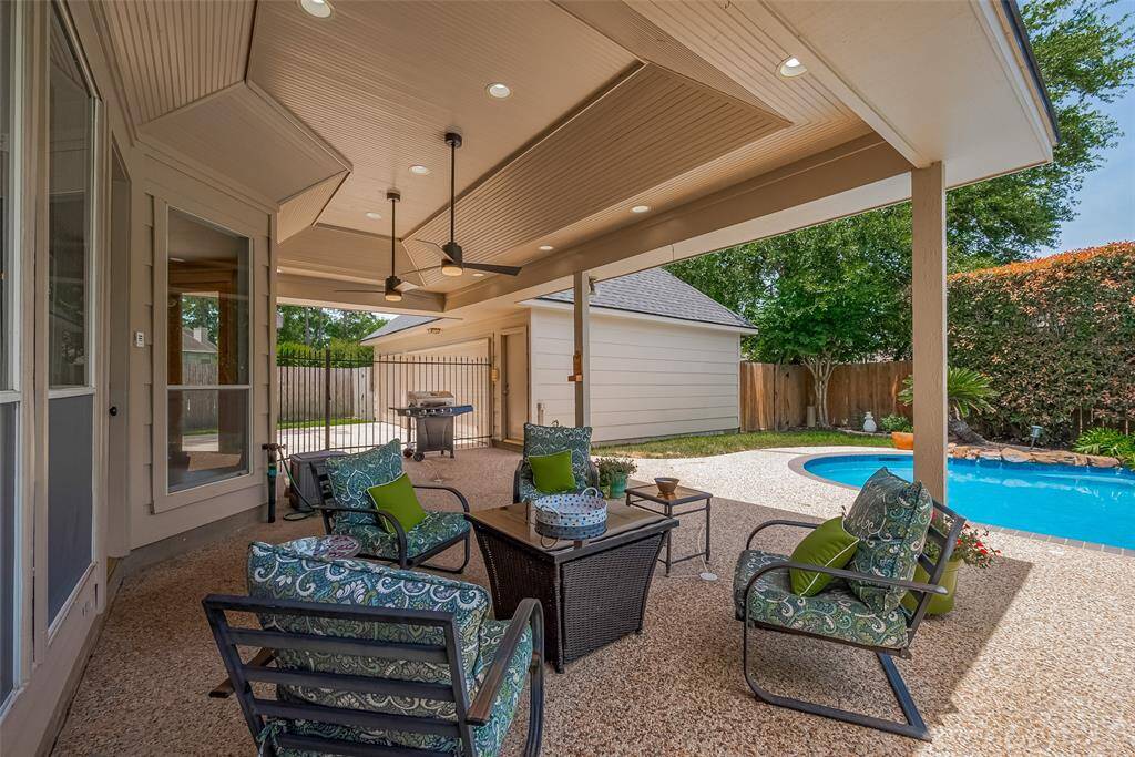 Outside this oversized covered patio is spacious. Facing north, this area should be shaded most of the day.