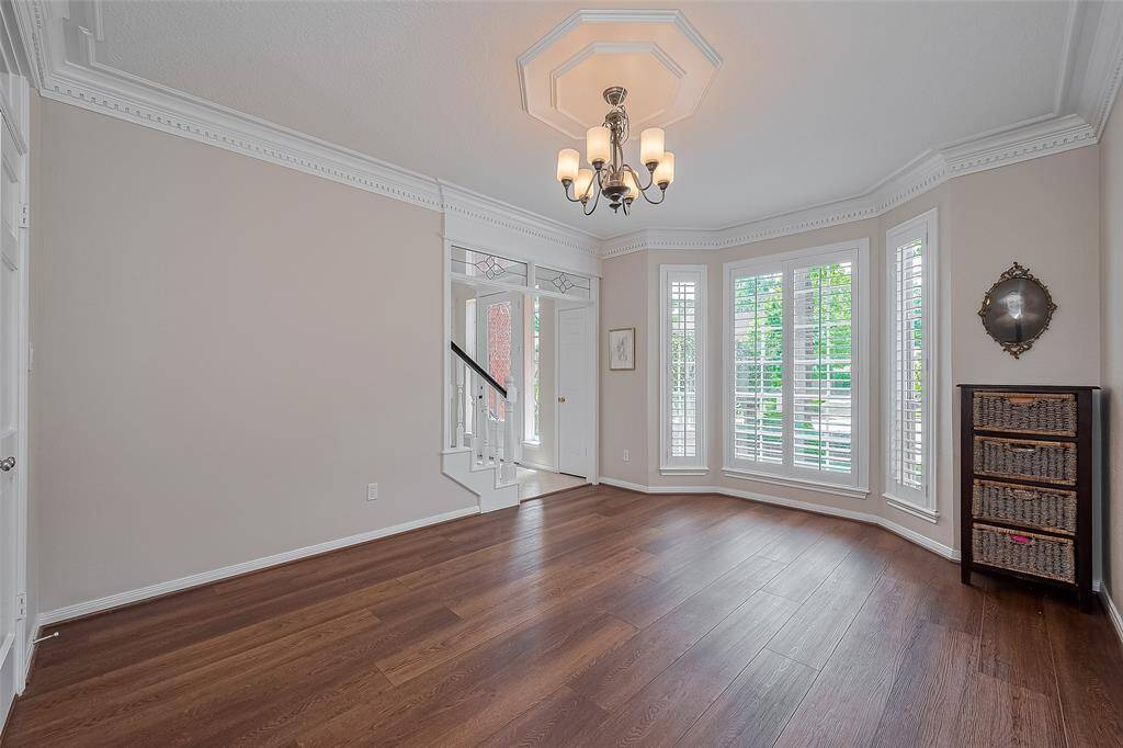 Updated Coretec wide 9 inch plank LVP floors in most of the home including the formal dining room.  NO Carpets in this home.