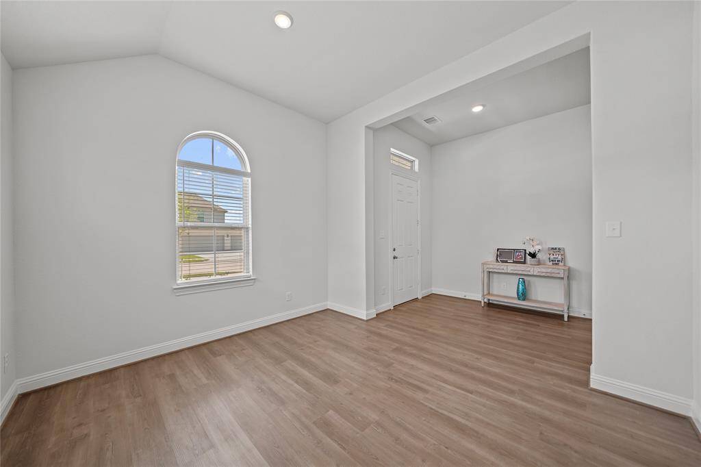 Formal Room faces the Front of the Home and Entrance Foyer.
