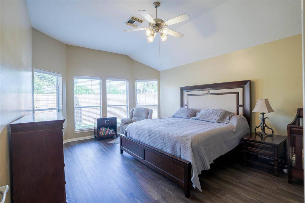 Primary bedroom! Big furniture pieces fit in this massive bedroom.