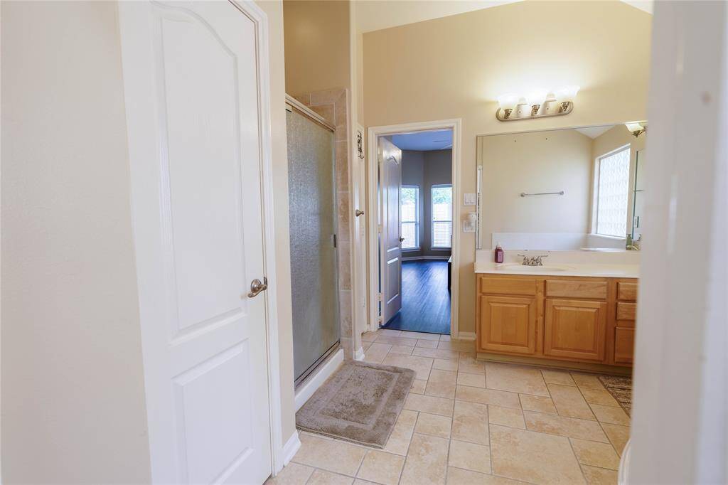 The primary bathroom also has a stand-up shower!
