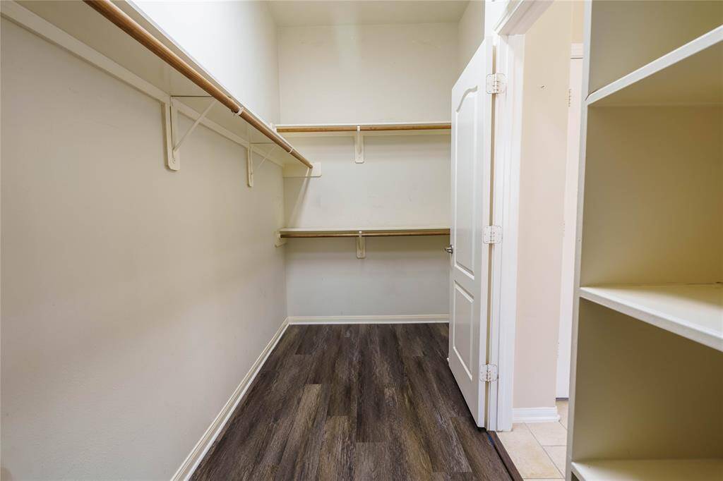 There is plenty of space in this massive primary closet!