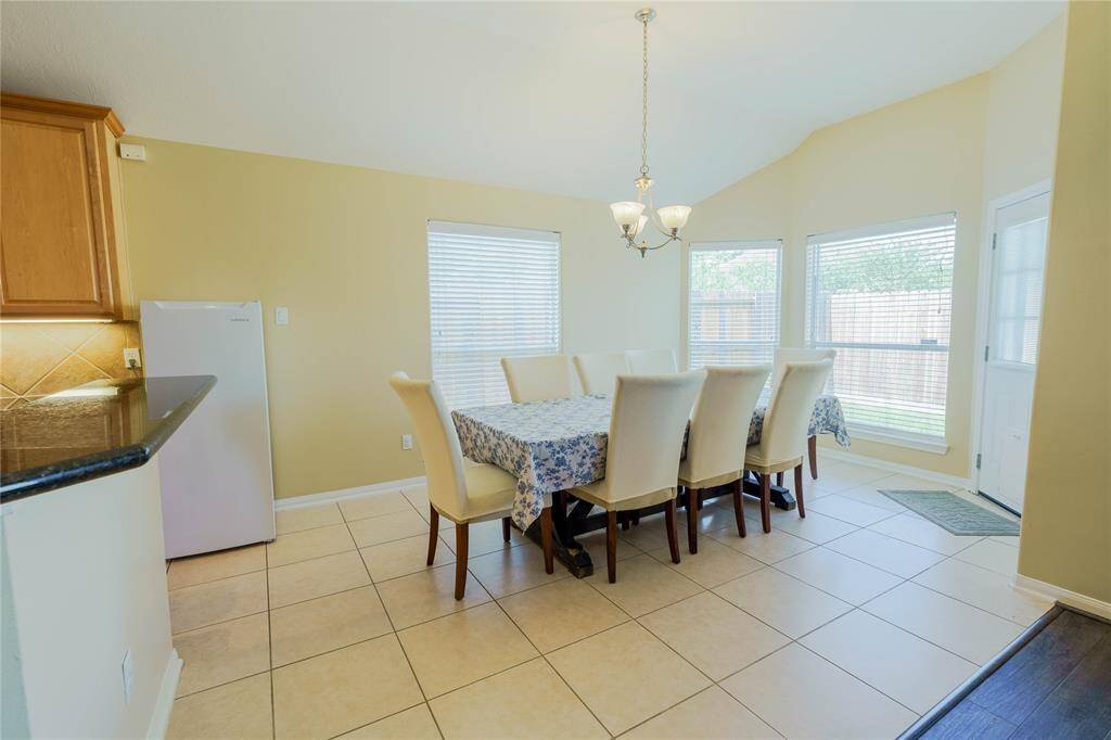 Dining room area counts with lots of natural light!