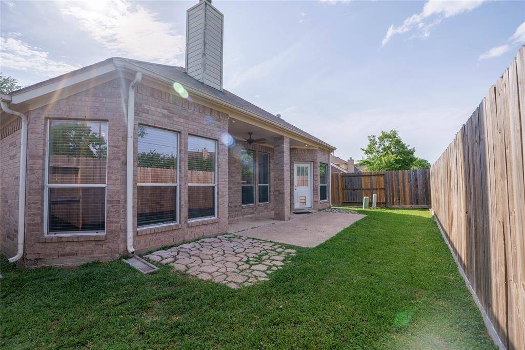 Covered patio with two recently installed ceiling fans, per seller!