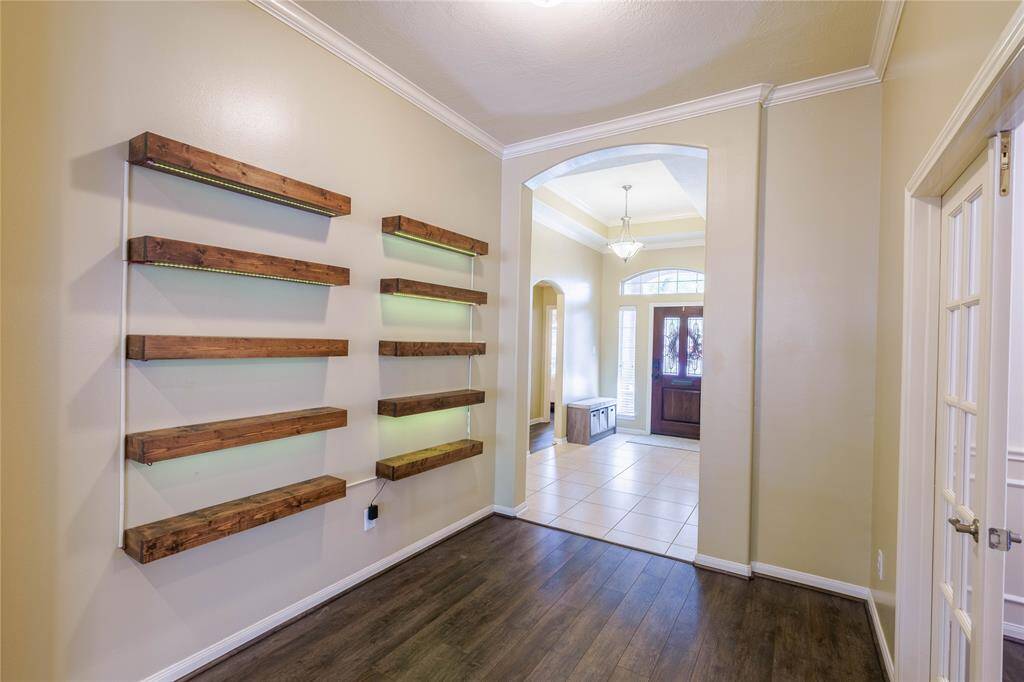 The house shows like a model home! Floating shelves stay with the home or may be removed!