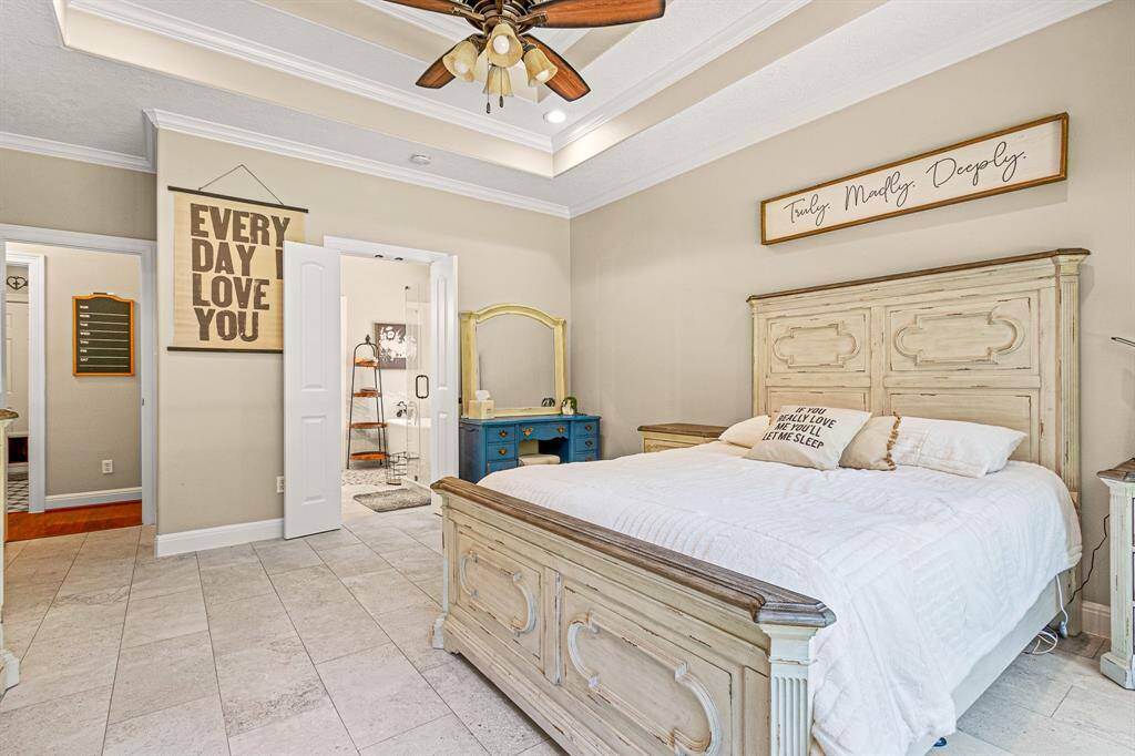Enjoy the added sense of style added by the tray ceiling and crown molding!