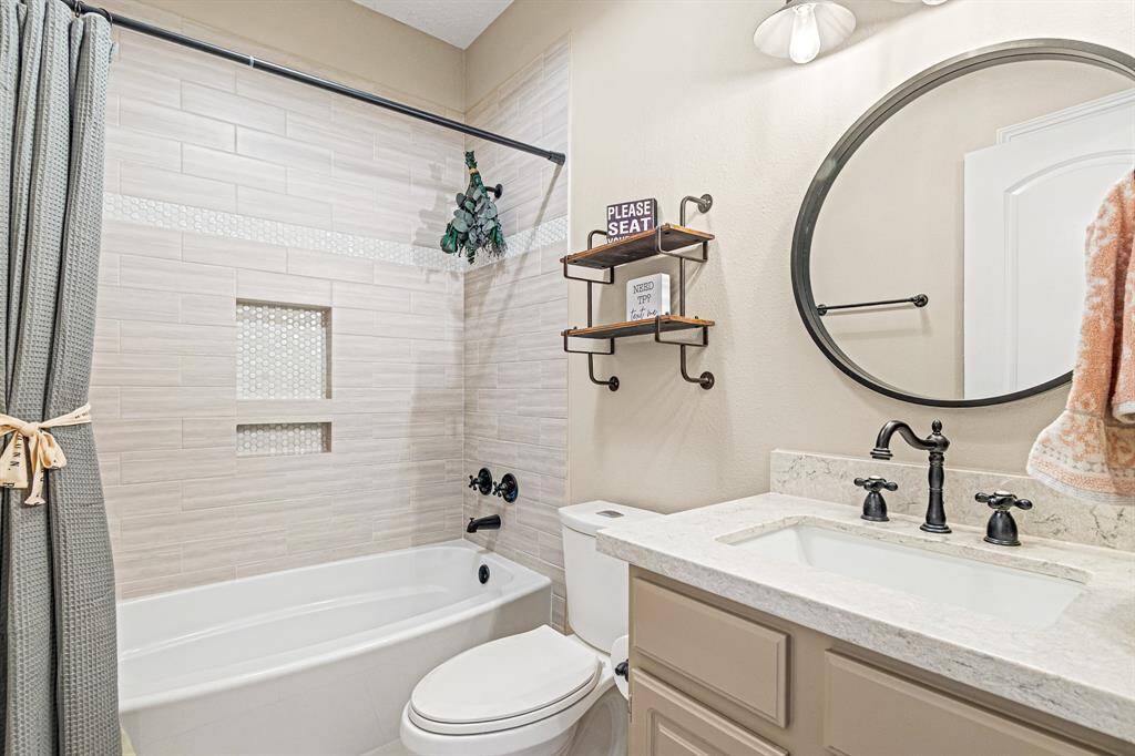 The Renovated Secondary Bathroom offers a fresh and stylish experience.