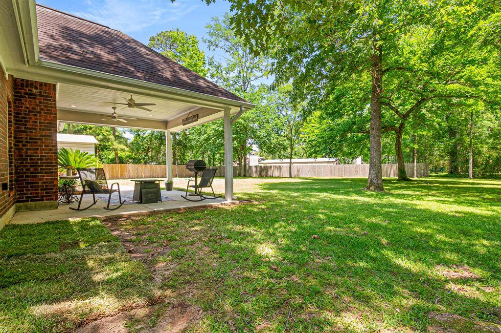 Create your dream outdoor living space in this serene setting.